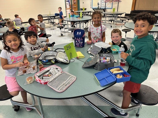 First Grade students enjoying their lunch