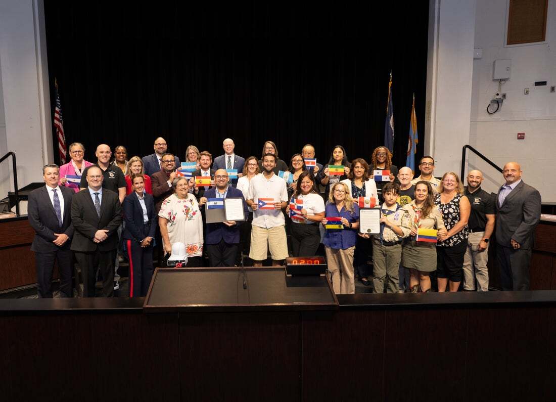 September 11 School Board Meeting poses for Hispanic Heritage Month proclamation