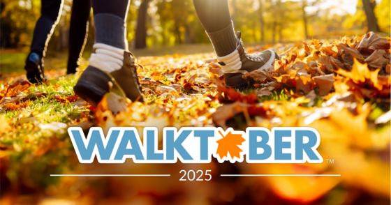 Photo of feet walking in leaves