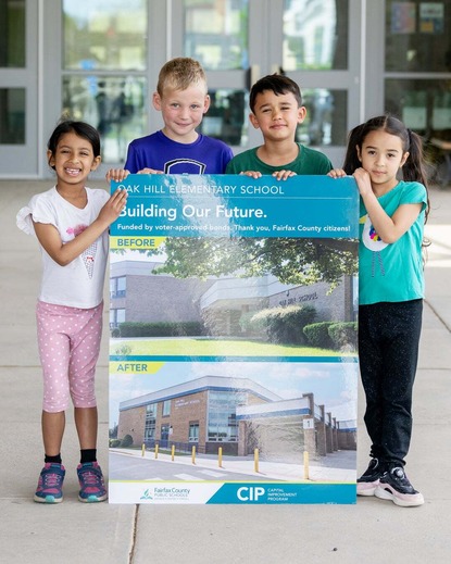 Students holding a sign about the Bond Referendum