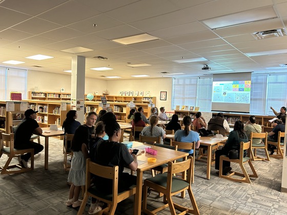 Families attend a meeting 
