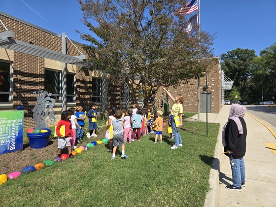 Kindergarten students went on a sensory walk to learn about the five senses and then recorded their observations.