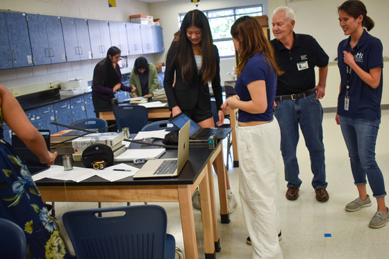 Jim Rose working with TJ Students on physics lab