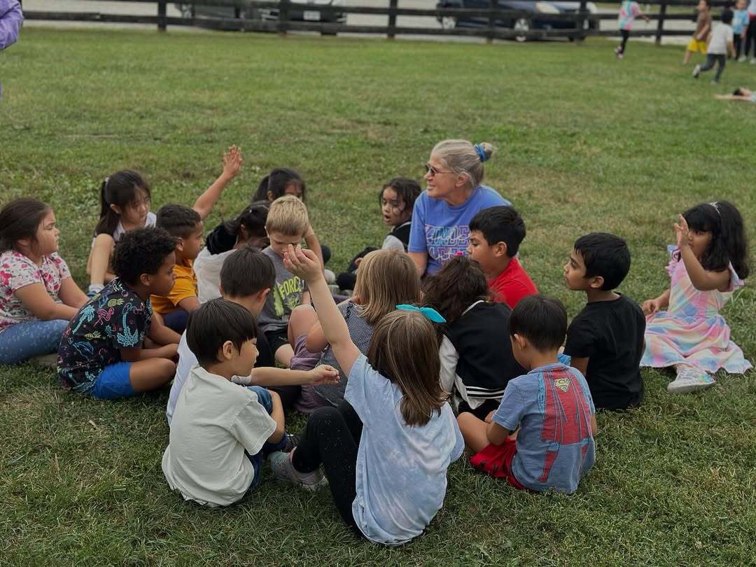 students and teacher on field trip