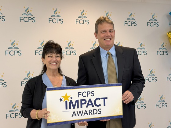 photo of Irene Hall and Rob Stringham after receiving their Impact Awards