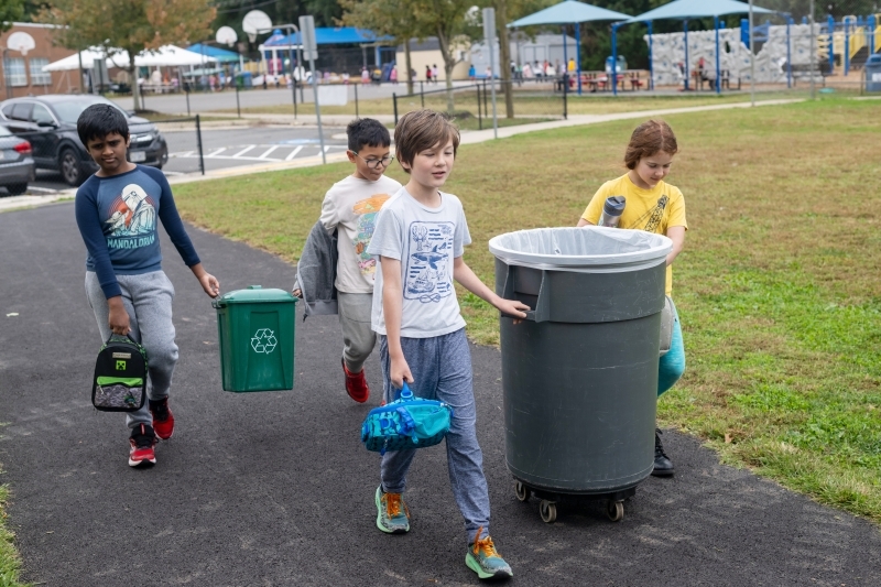 Students at Lemon Road Elementary School conduct compost and trash collection efforts during their recess.