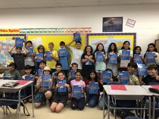 students holding agendas