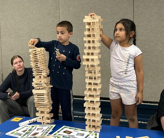Students build towers out of Keva planks