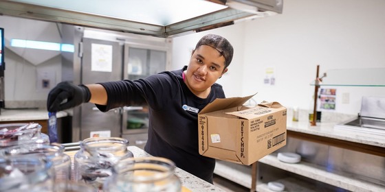 Paola working in a kitchen