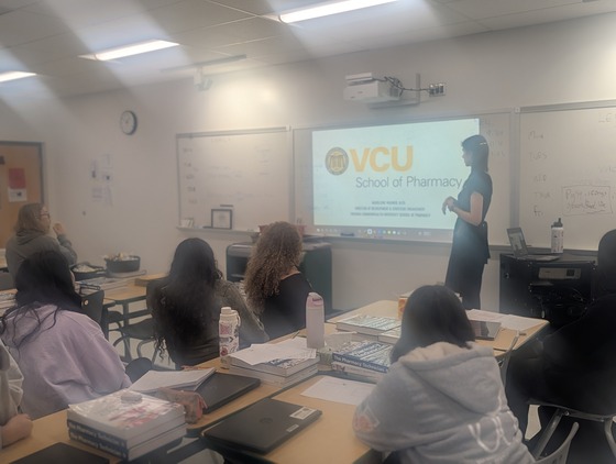 students listen to VCU Pharmacy representative