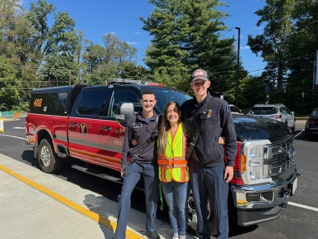 students and staff with Fx. Co. Fire rig