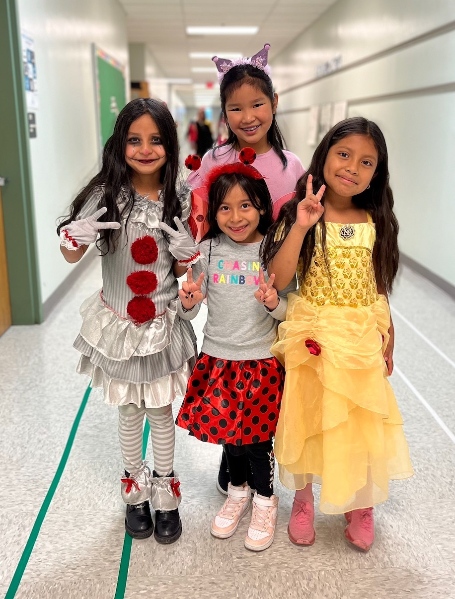 Students pose in their storybook character outfits 
