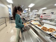 student in the cafeteria line