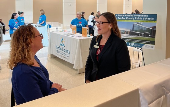 Western HS talking to constituent