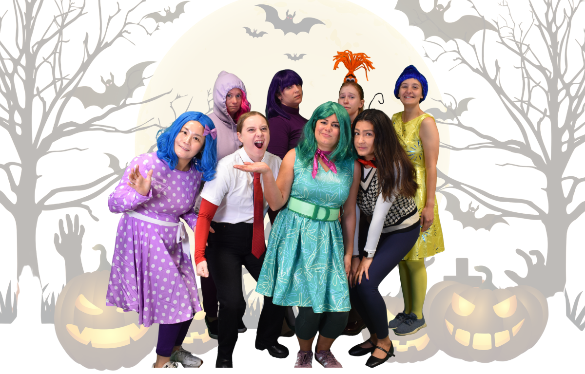 staff dressed up as inside out characters