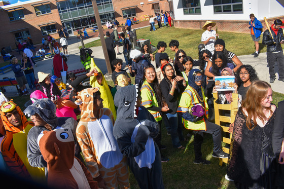 TJ students in their Halloween costumes including the winning group, "The Louvre Heist"