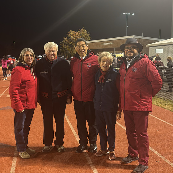 Mike Mukai, Elizabeth Lodal and Geoff Jones at tailgate event