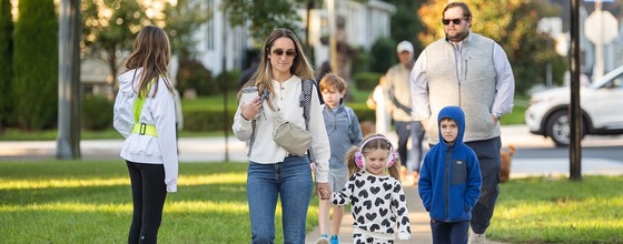 family walking to school together
