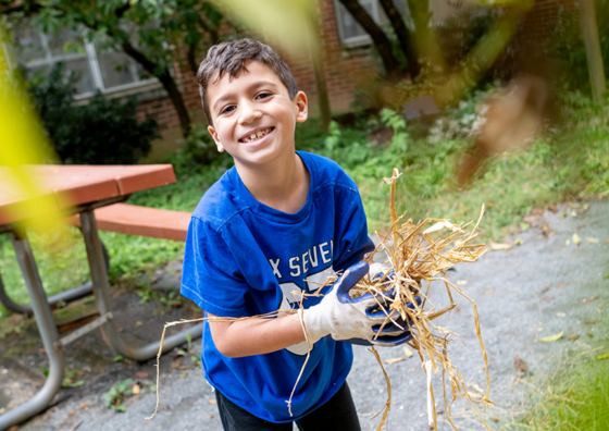 Kid with plants