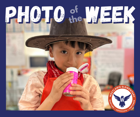 a student smells a container of mystery spice