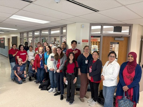 Staff wearing red white and blue 