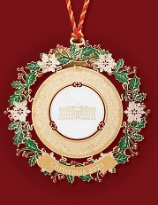 Ornate circular Christmas ornament with holly leaves, snowflakes, and "Christmas 2025" banner.