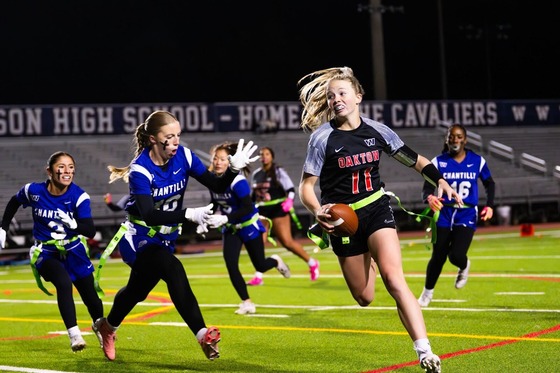 students during a flag football game