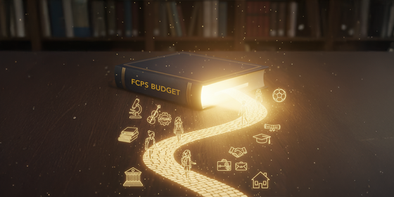 FCPS Budget book laying on table with lit up pathway leading to book