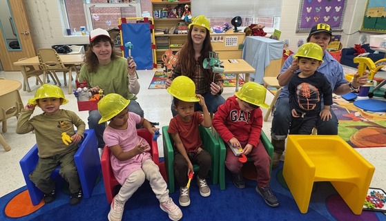 Class wearing construction crew outfits