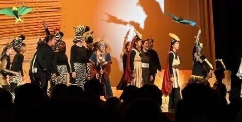 students performing in a play