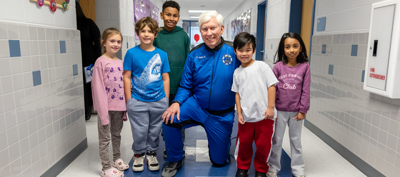 astronaut with students