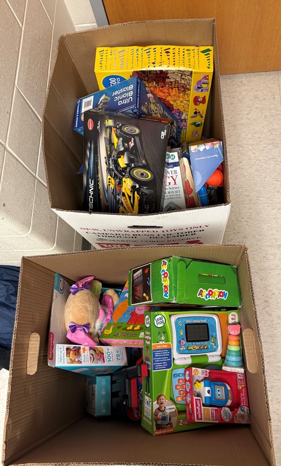 A box filled with lots of toys collected in TJ's Toys for Tots drive