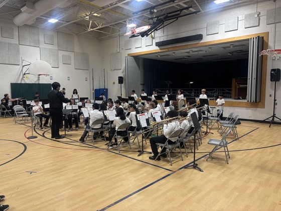 Band students play their instruments during the winter concert 