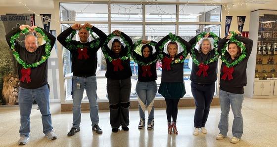 Decking the halls... literally! 🌿 Happy Holidays from your Admin Team.
