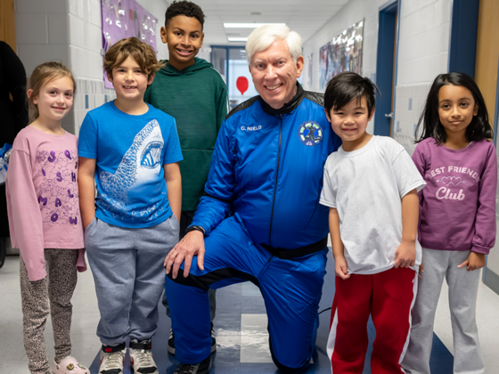 George Nield with students