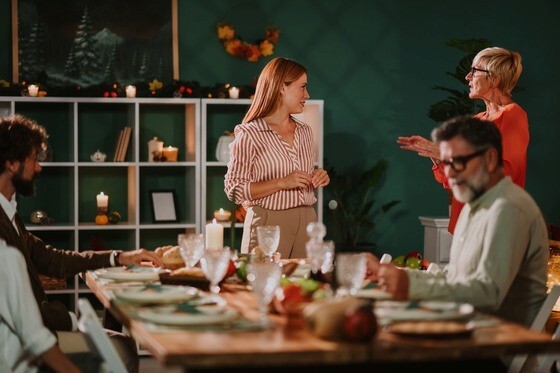 photo of people gathered at a festive table