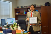 Mike Mukai with Outstanding Principal award