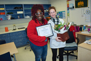Outstanding School-Based Professional Employee Dr. Maria Cruz with her award.