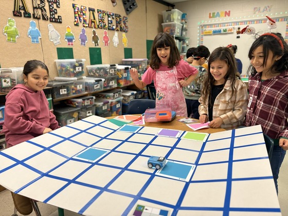 students using small robot car
