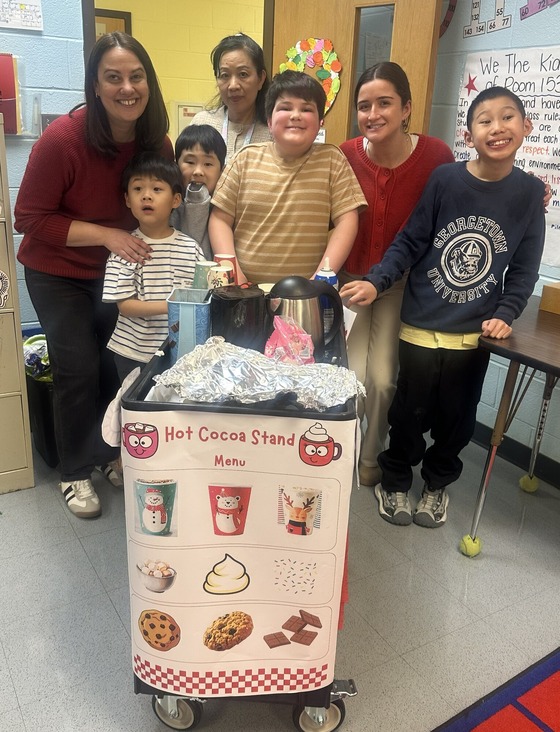 Students spreading their wintry spirit while visiting classrooms to offer a hot chocolate treat to teachers during our Winter Break Spirit Week.