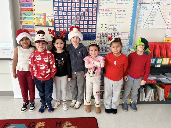 Students smile in their pajamas 