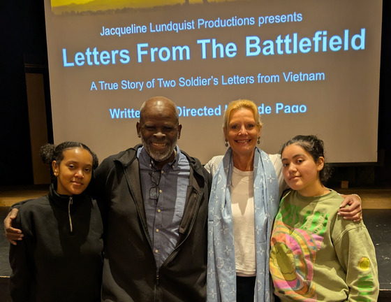 Directors posing with students