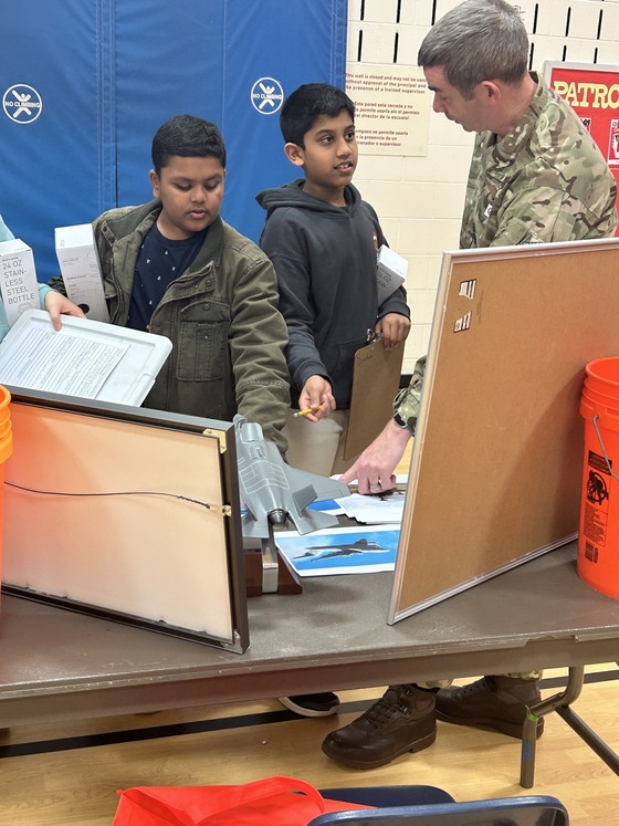 Students listen to presentation at the Career Fair