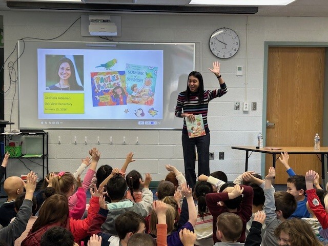 Students listening to an author