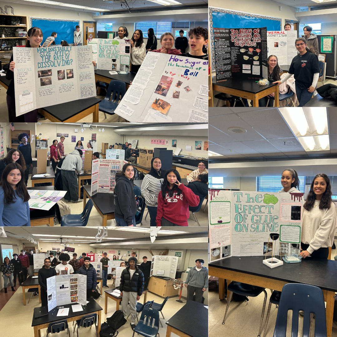 students standing in front of their science fair boards