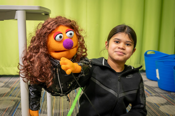 5th Grade student with puppet preparing for BNN