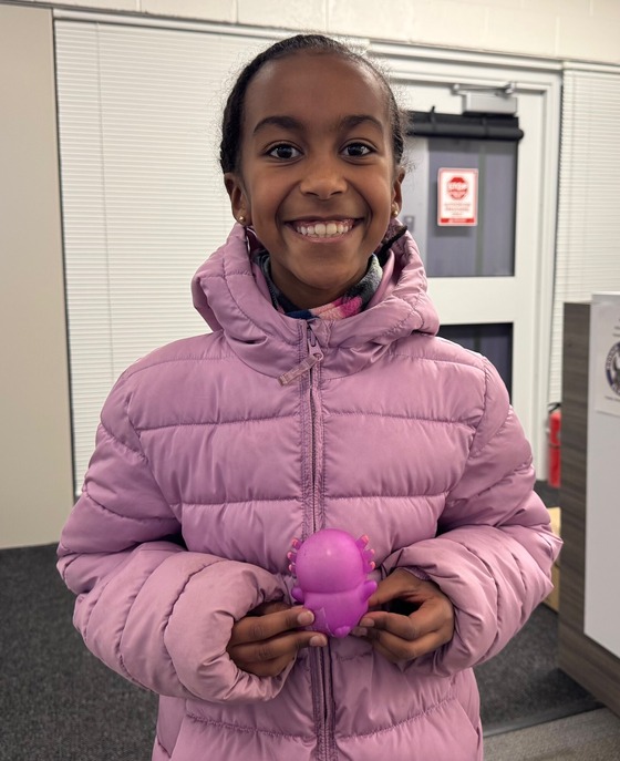 smiling student in the front office