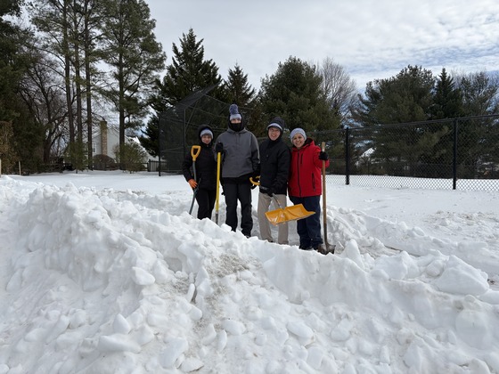 Oak Hill Custodians shoveling snow