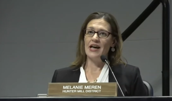 Melanie talking at a meeting