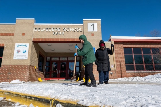 Facilities crew removing ice